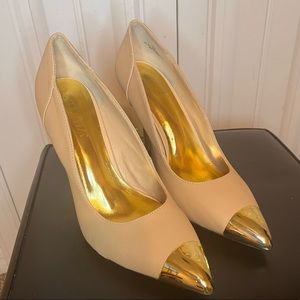 Nude with gold accent pumps